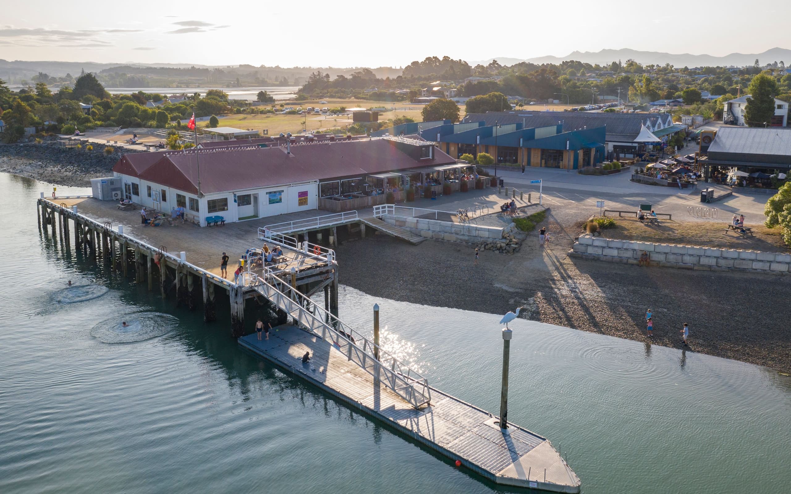 Māpua Wharf is a lively waterfront hub where you’ll find boutique shops, fresh local flavours, and epic coastal views.
