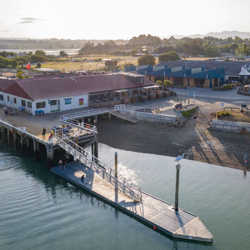 Māpua Wharf is a lively waterfront hub where you’ll find boutique shops, fresh local flavours, and epic coastal views.