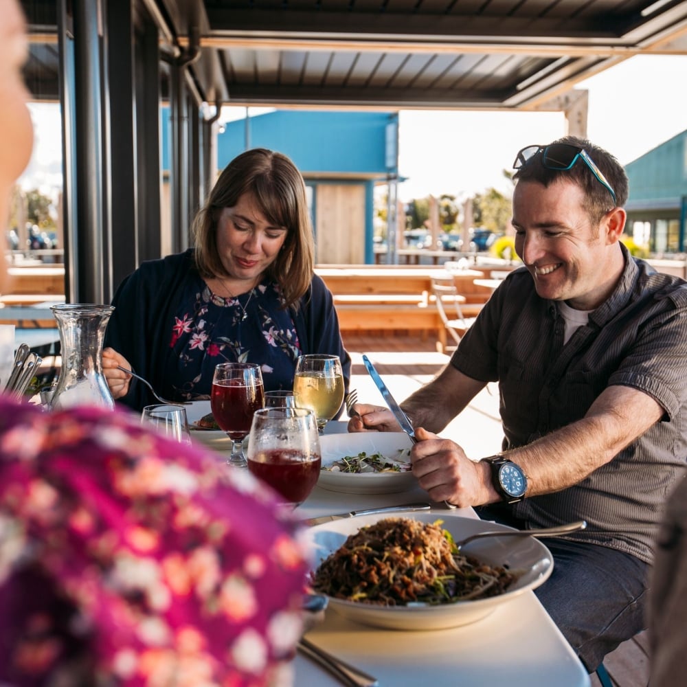 Dine at the water's edge in charming Māpua Wharf.