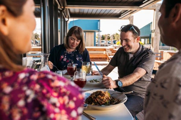 Dine at the water's edge in charming Māpua Wharf.