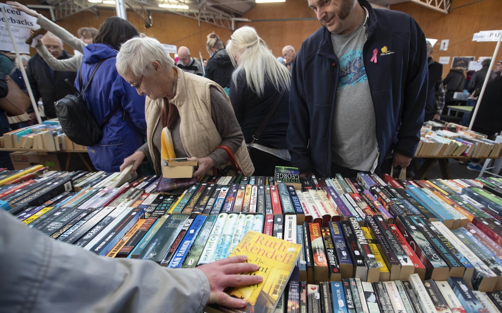 people browsing books at BookFair credit tim cuff
