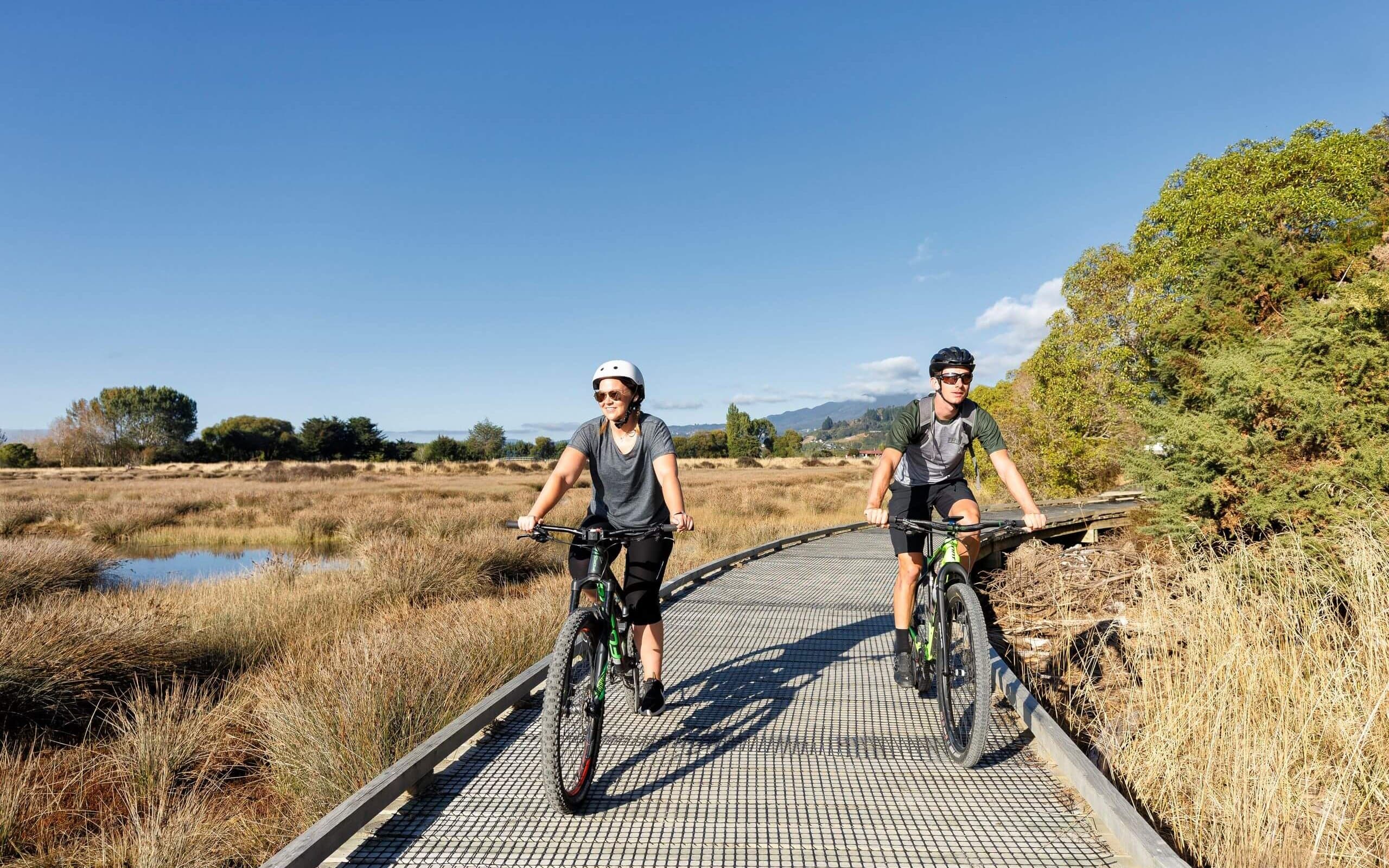 Couple biking Great Taste Trail by Virginia Woolf
