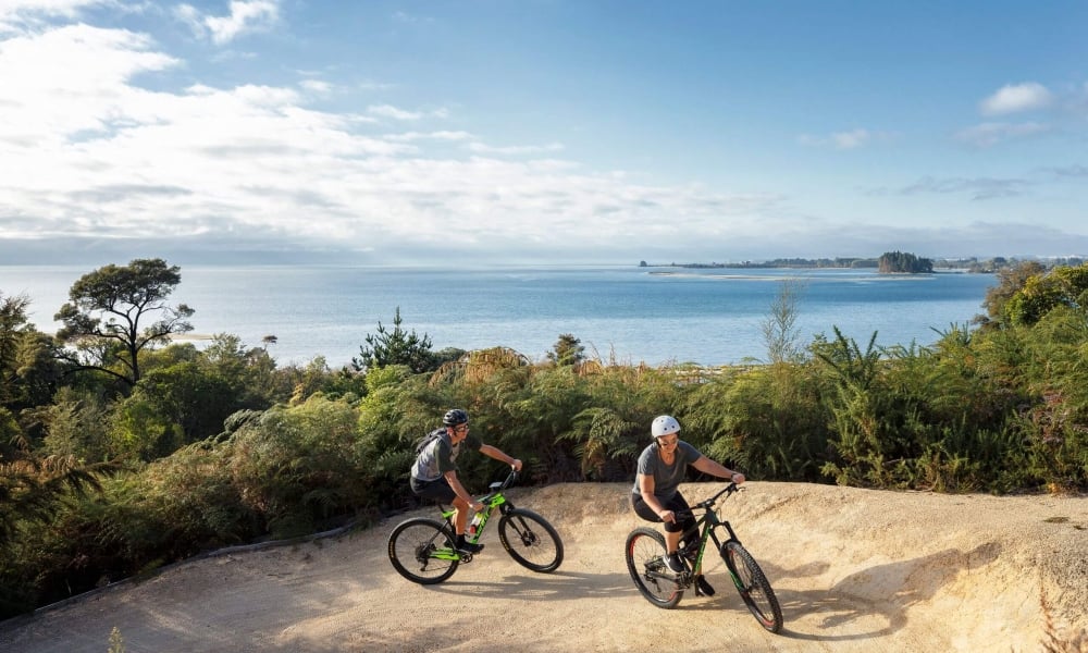 Experience the sparkling coastal scenic journey along Tasman's Great Taste Trail in Kaiteriteri.