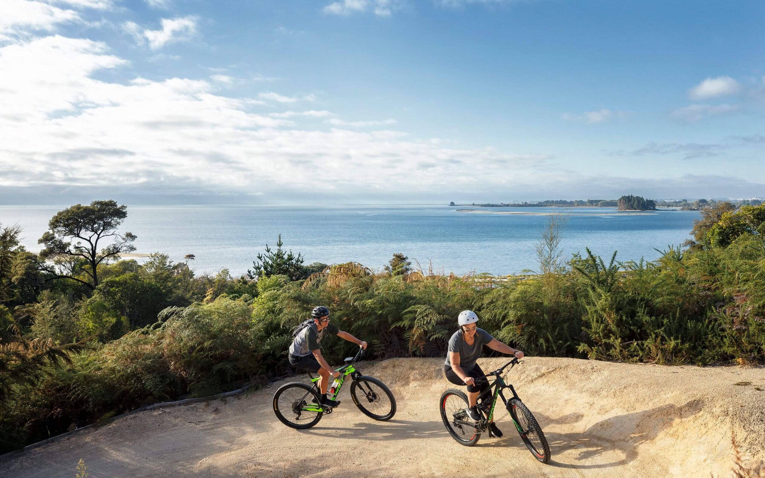 Experience the sparkling coastal scenic journey along Tasman's Great Taste Trail in Kaiteriteri.