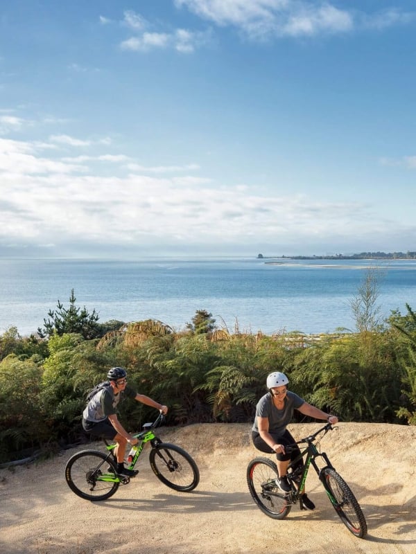 Experience the sparkling coastal scenic journey along Tasman's Great Taste Trail in Kaiteriteri.