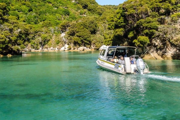 Discover secluded coves and pristine shores with Abel Tasman Aqua Taxi.