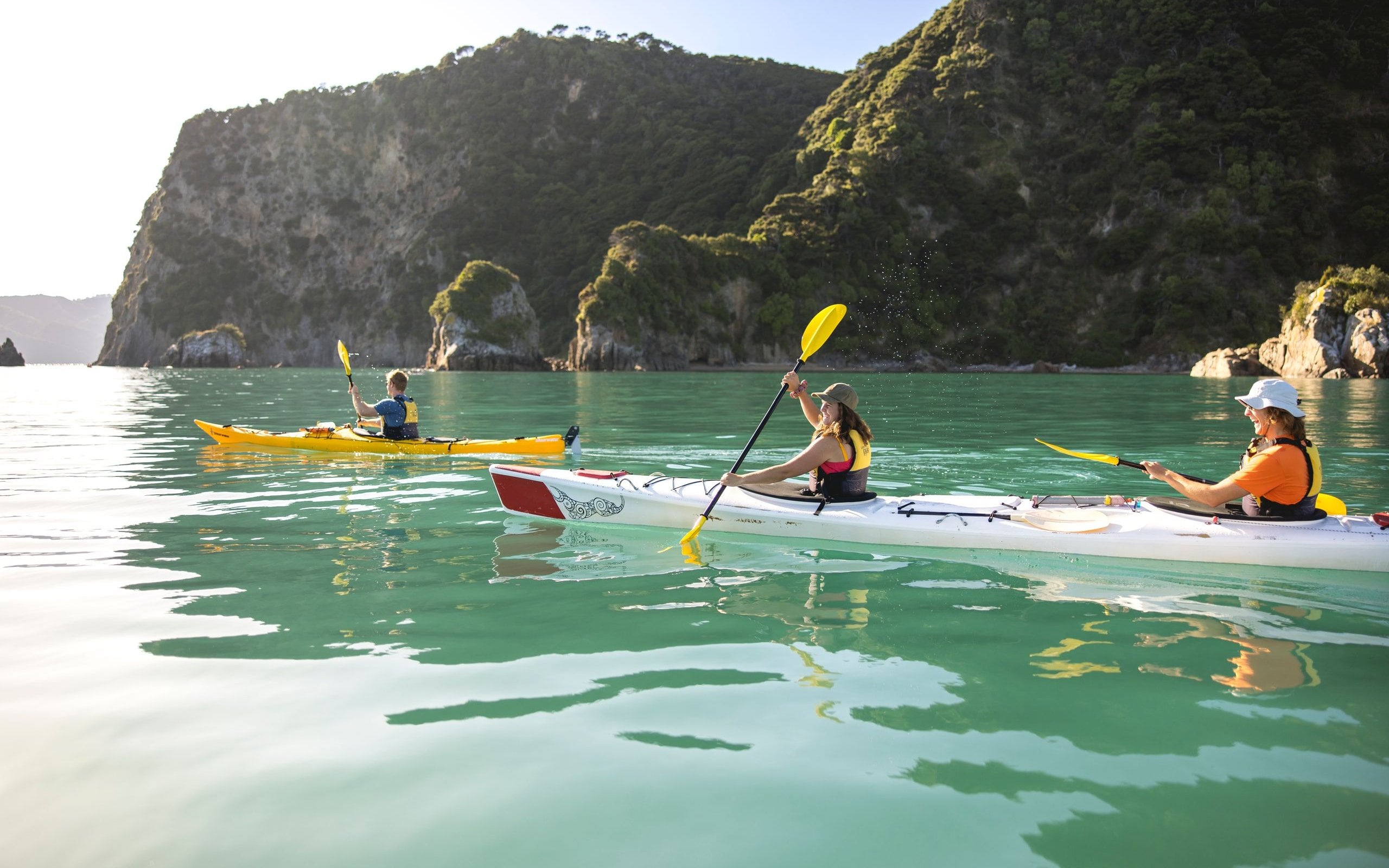 Explore the crystal-clear waters and hidden coves of Golden Bay.