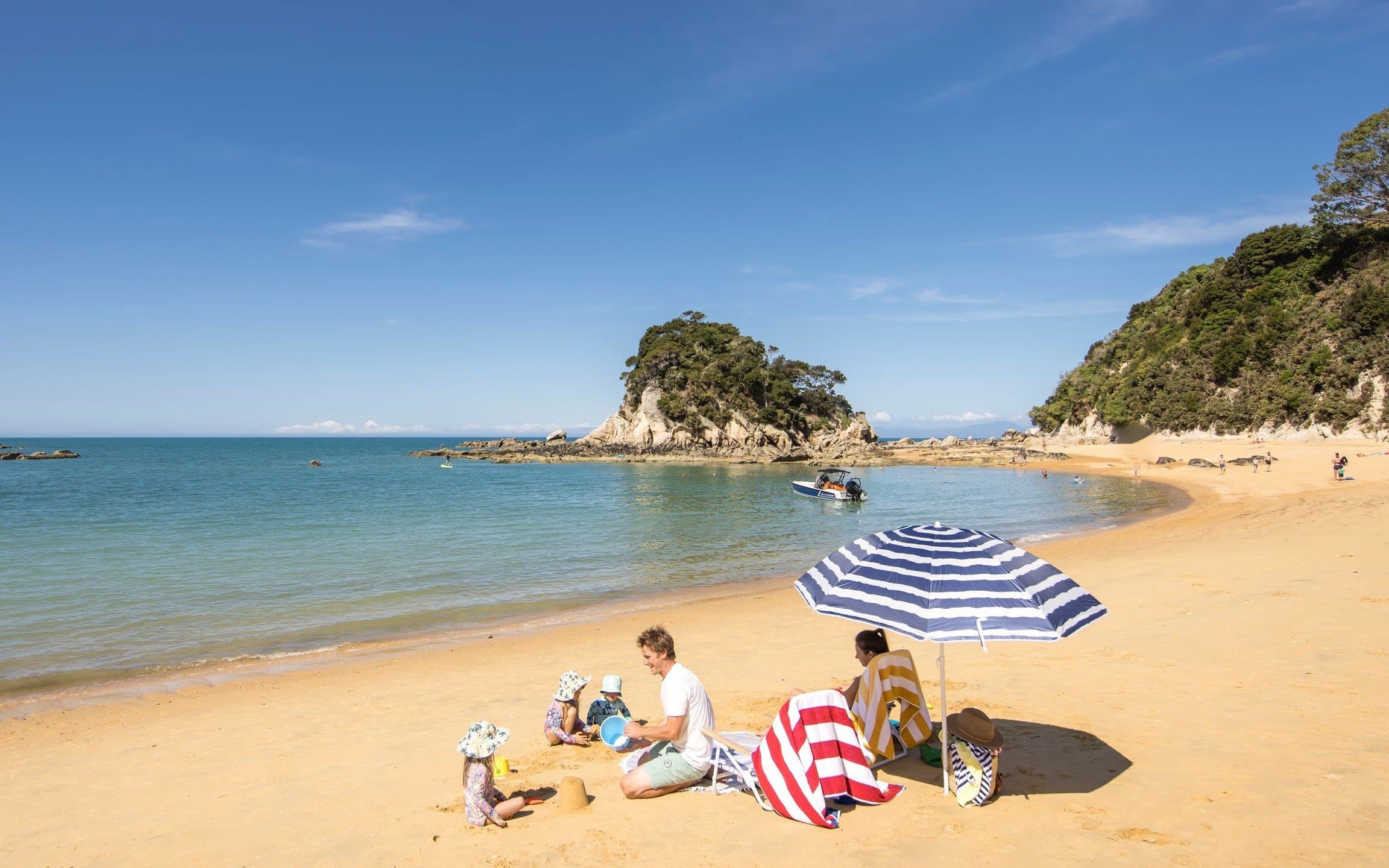 Kaiteriteri Beach, where golden sands and crystal-clear waters create endless fun for all ages.