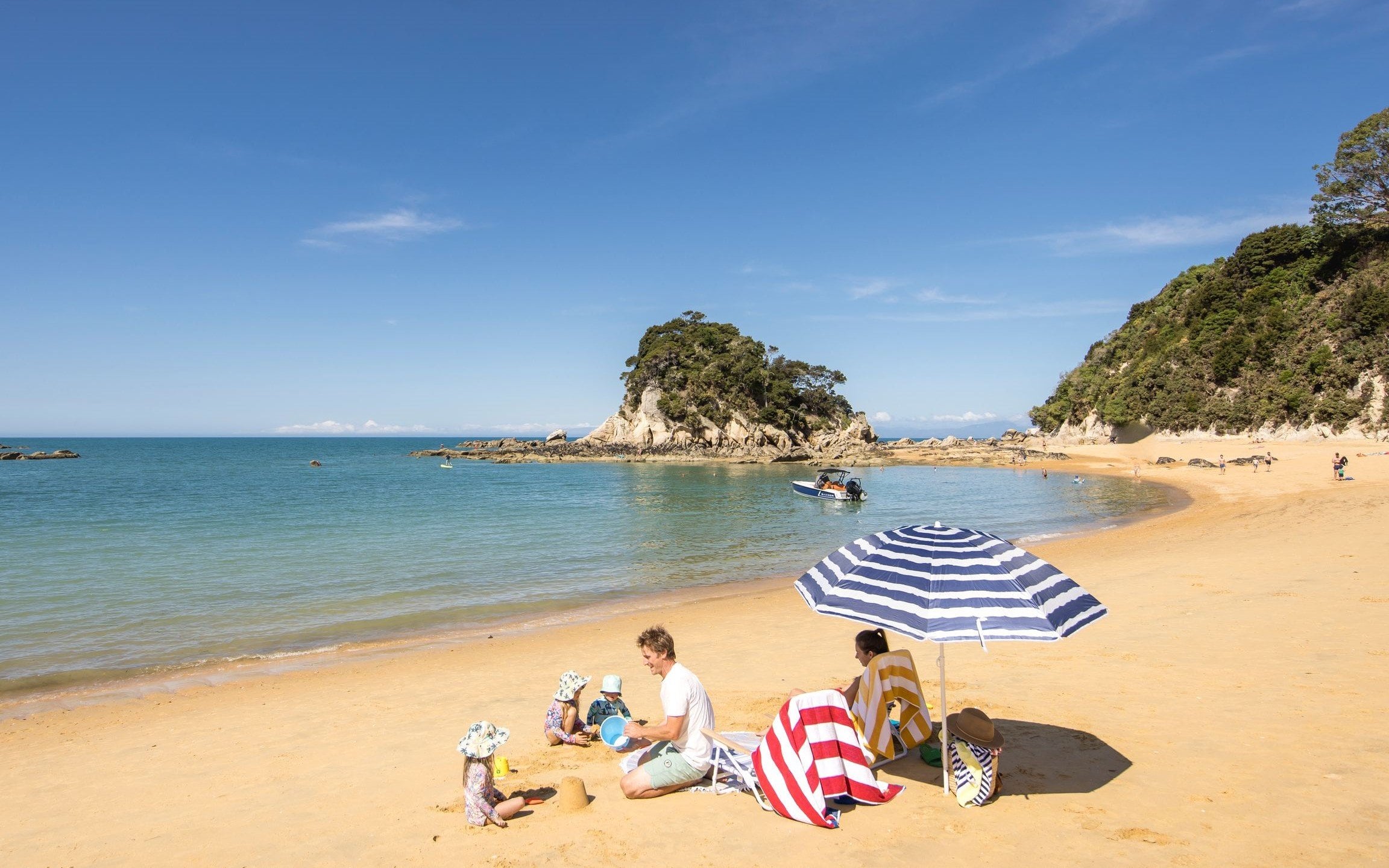 Kaiteriteri Beach, where golden sands and crystal-clear waters create endless fun for all ages.