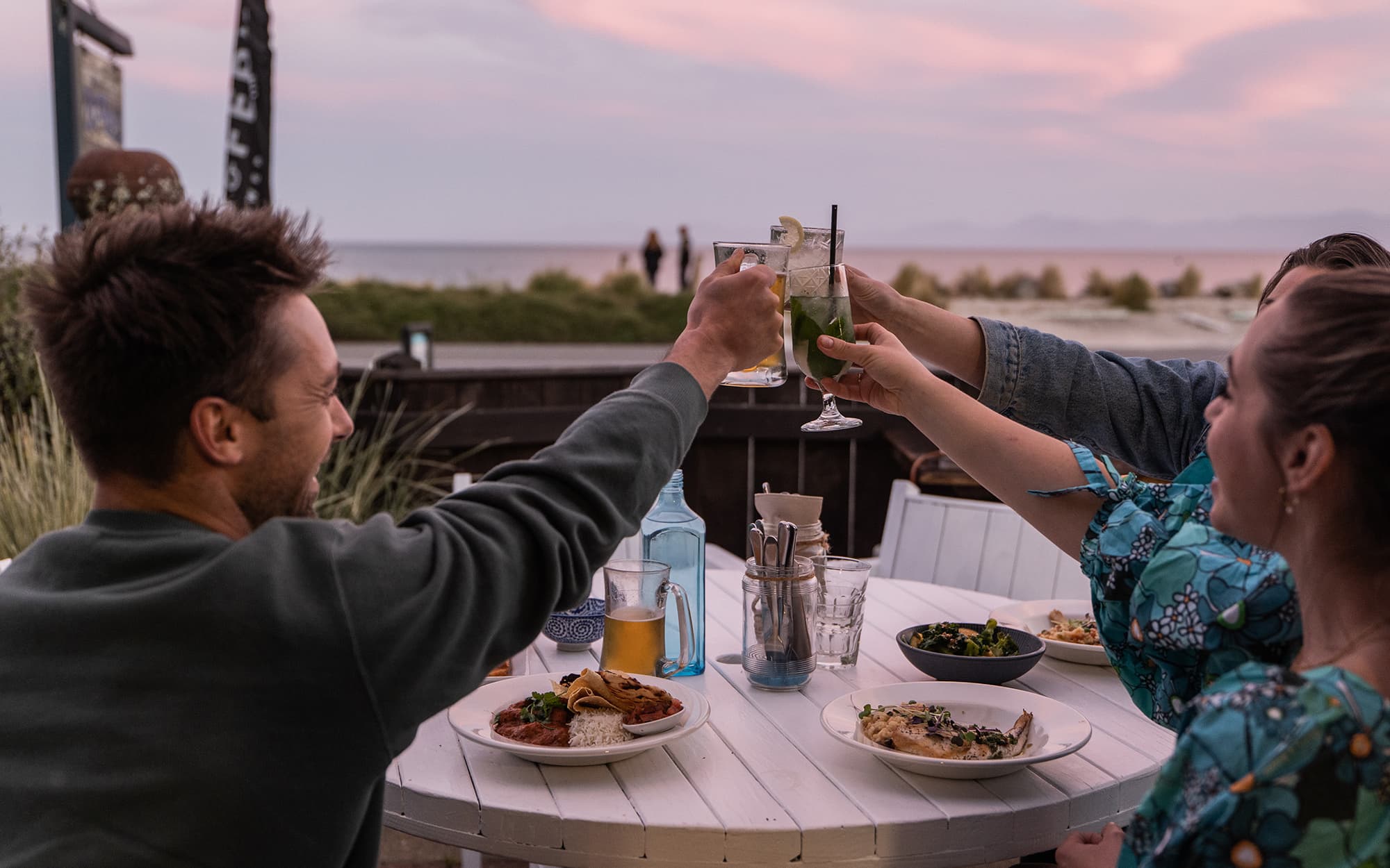 Tuck into fresh, local seafood at Hooked on Mārahau, a relaxed beachfront eatery with unbeatable views of the Abel Tasman coastline.