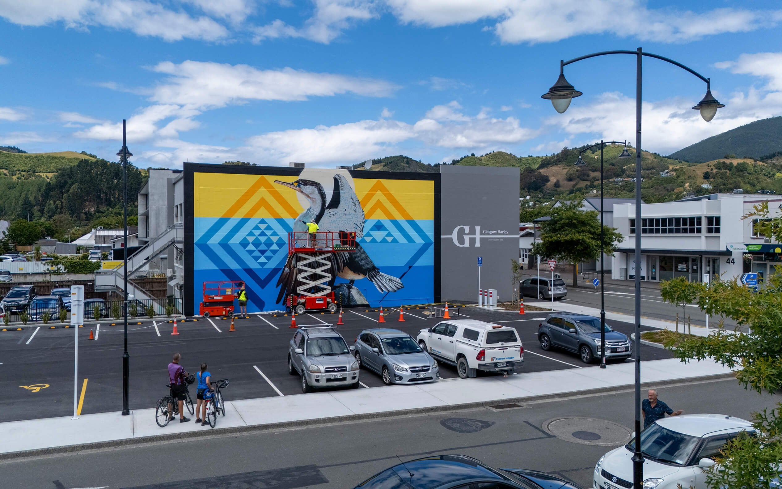 Waitī, Waitā, Waiora. Kāruhiruhi (Phalacrocorax varius). Toi māori mural at Millers Acre in Whakatū by Charles and Janine Williams.