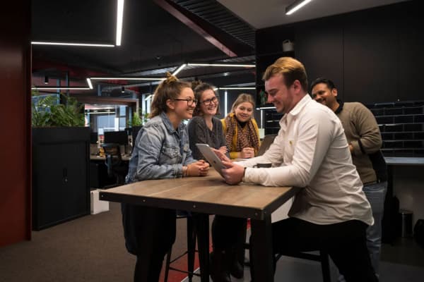 coworkers meeting and working credit nrda