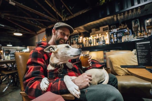 Grab a seat by the fire, soak up the atmosphere, and bring your pup along.