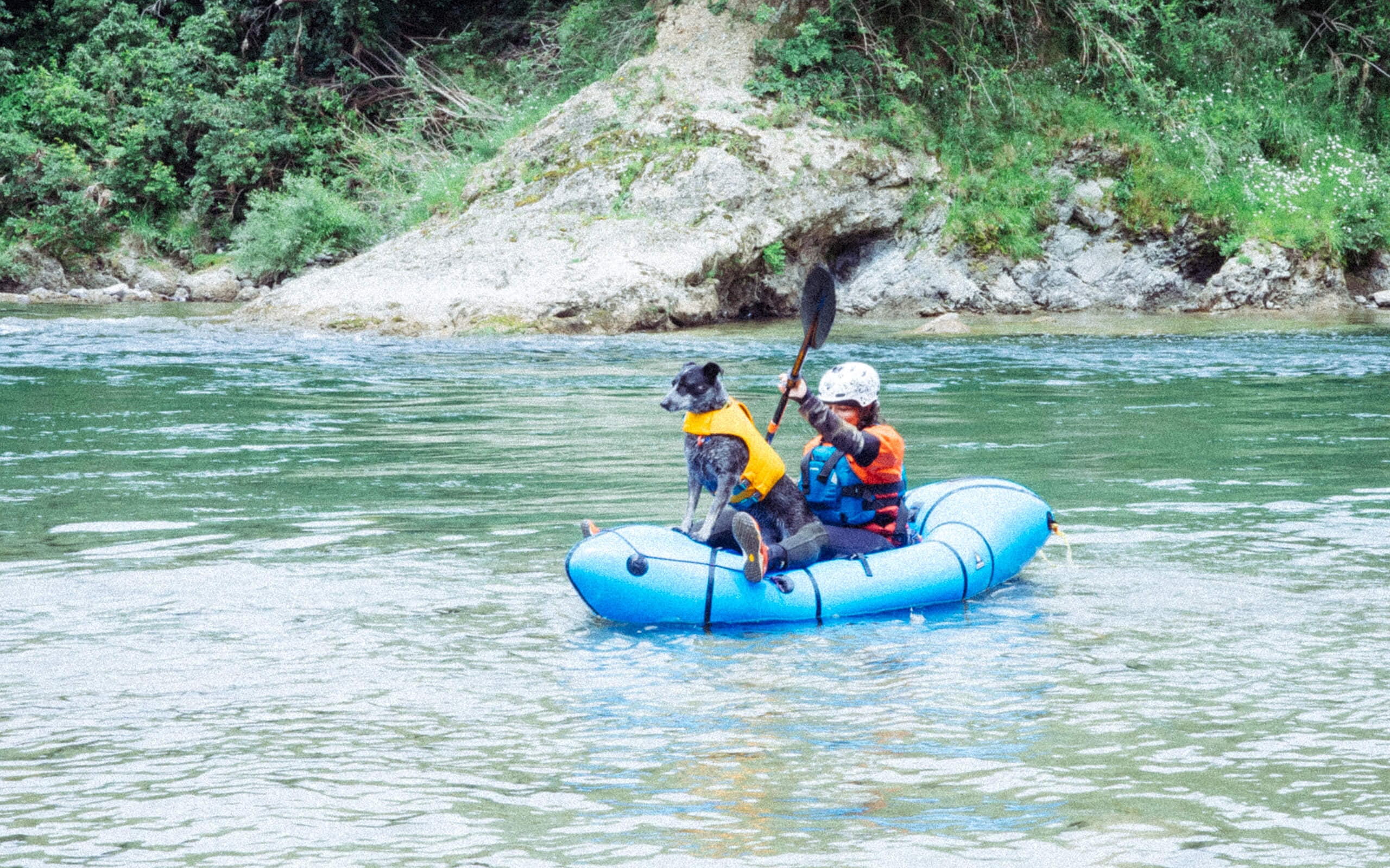 Teaching Coya to chill in the packraft. It's a work in progress.