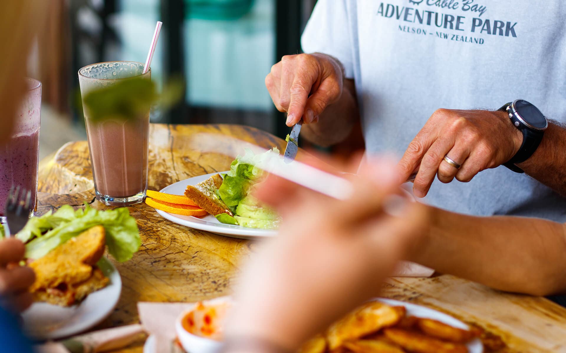 Hit the trails then have a feed at the Base Café at Cable Bay Adventure Park.
