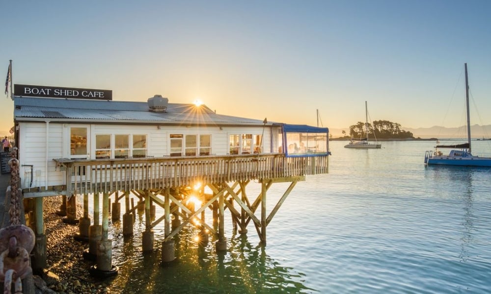 Dine by the water's edge at the Boat Shed in Nelson.