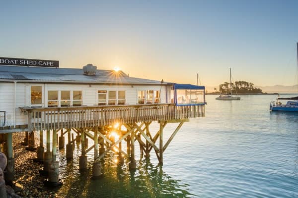 Dine by the water's edge at the Boat Shed in Nelson.