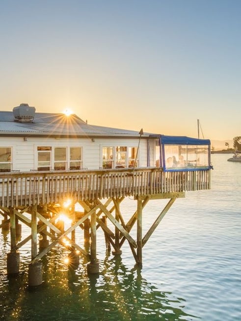 Dine by the water's edge at the Boat Shed in Nelson.