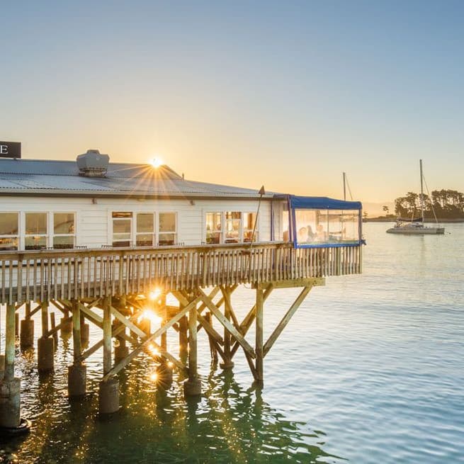 Dine by the water's edge at the Boat Shed in Nelson.