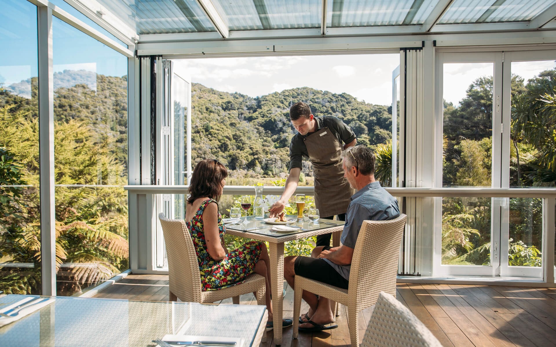 Couple dining at Awaroa Lodge Abel Tasman