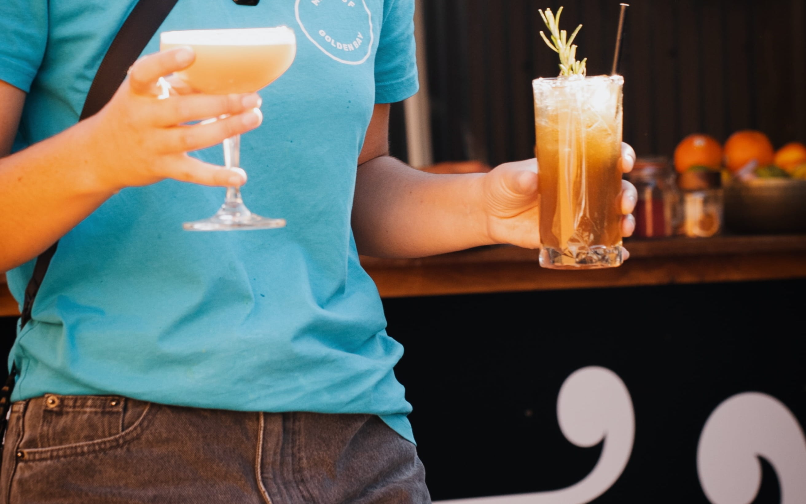 Kiwi Spirit Cocktail Bar and Tapas Zerlina carrying cocktails