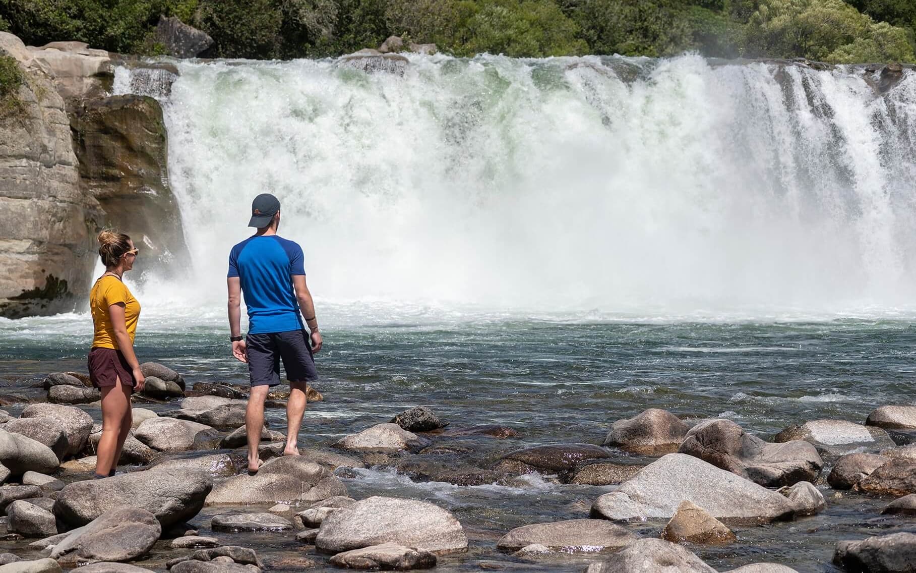 Couple standing at Maruia Falls Murchison Tasman
