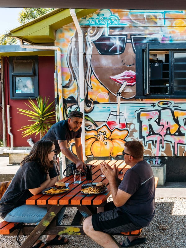 Roots Bar in Tākaka absolutely lives up to its alliterative motto—“beats, beers, burgers, bands”.
