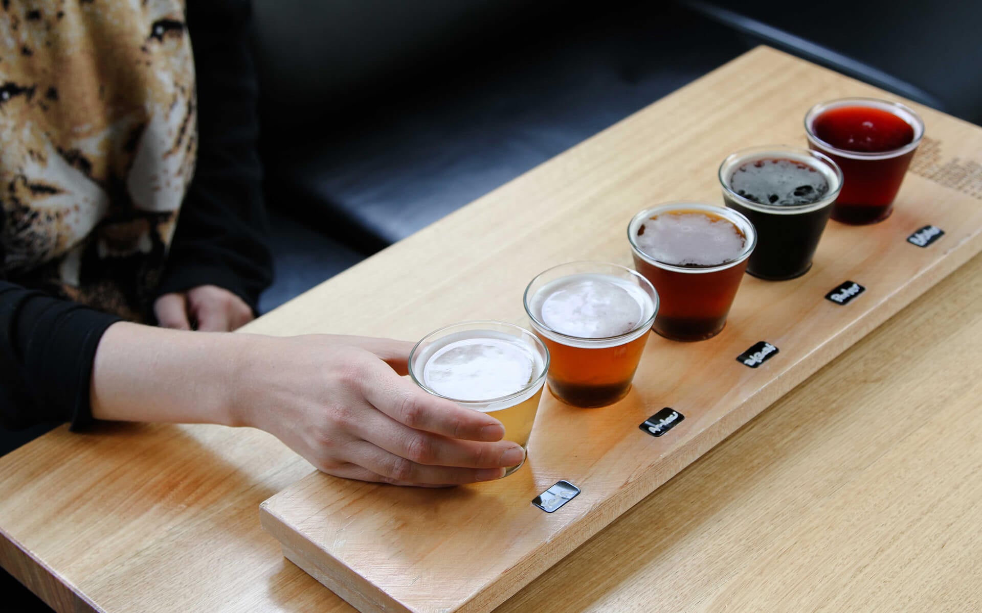 Sample a range of handcrafted beers with a tasting paddle at Sprig & Fern Motueka.