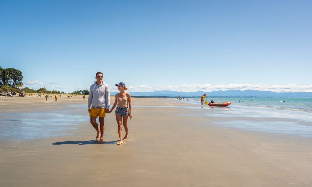 Walking Tahunanui Beach Print Res taken by Oliver Weber credit www.nelsontasman.nz