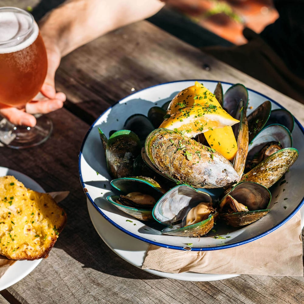 The Mussel Inn is where good brews, live tunes, and local vibes come together.