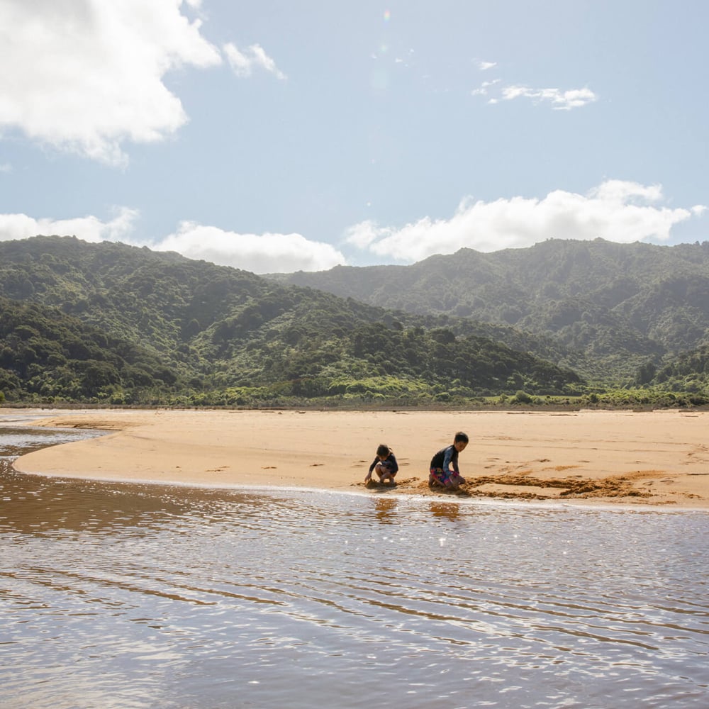 Family at Totaranui Beach credit theleostyle