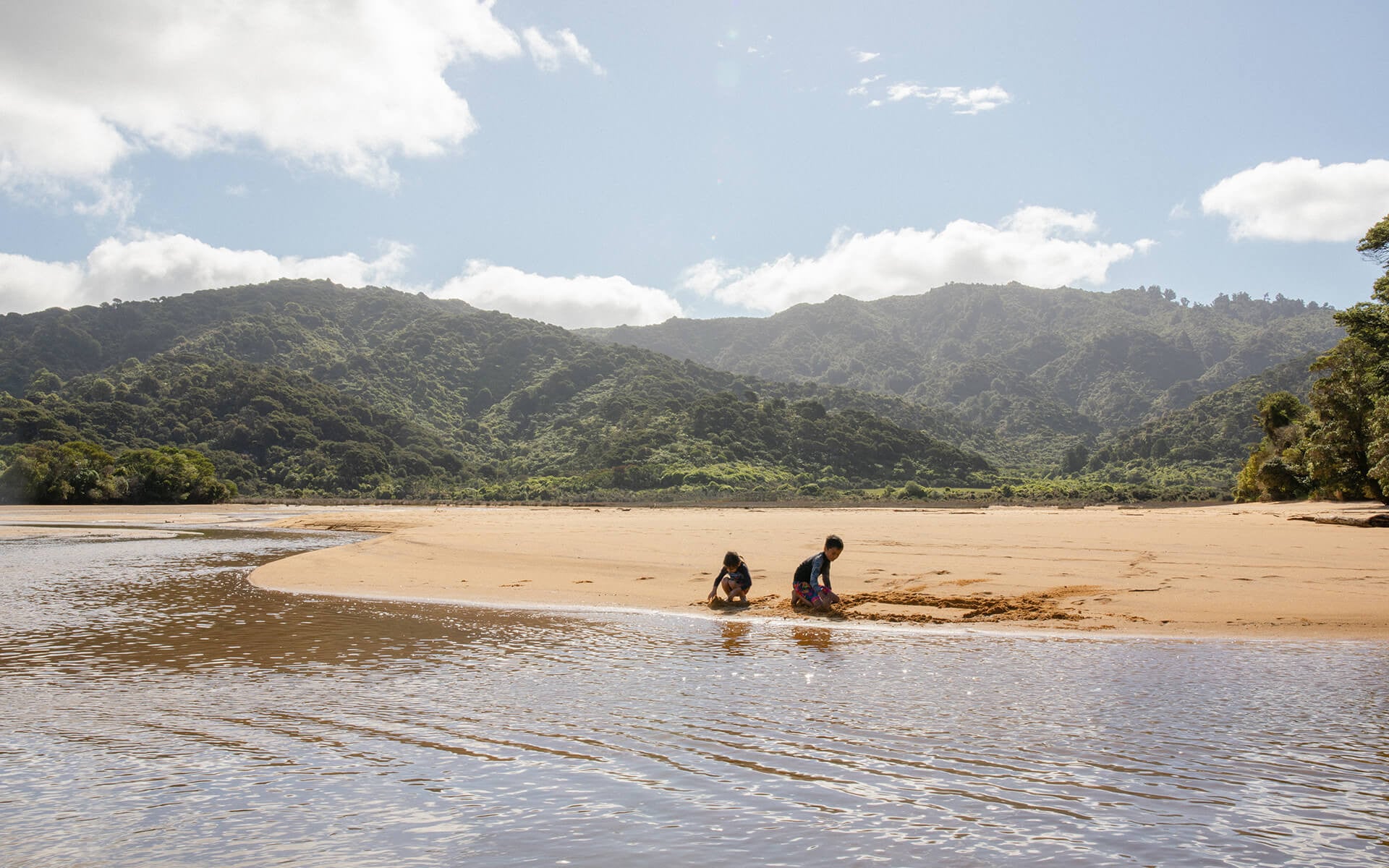 Family at Totaranui Beach credit theleostyle