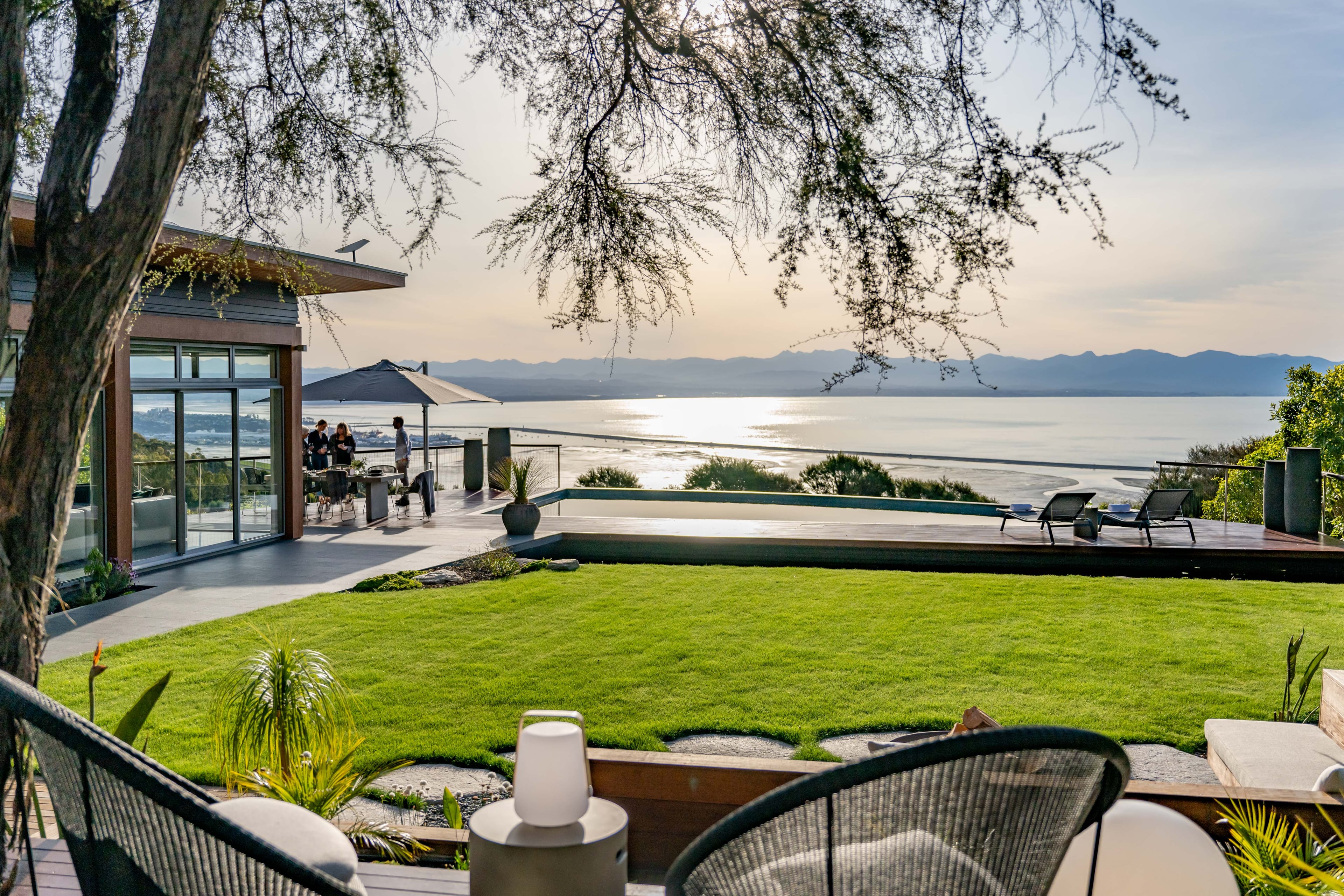 Overlooking Tasman Bay, Okoro Villa offers spectacular views and sunsets towards the Abel Tasman National Park.