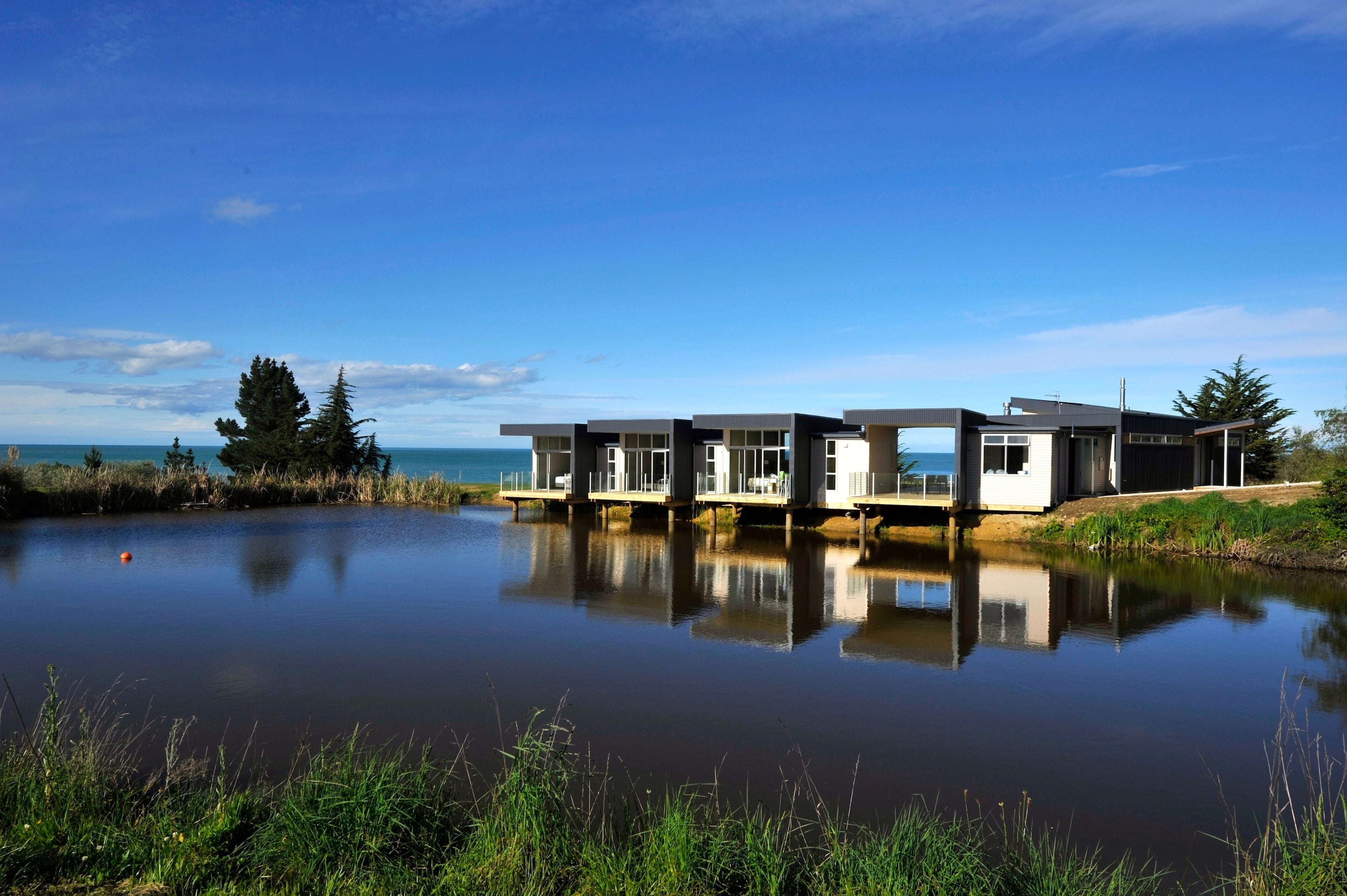 Three of the four suites overlooking the pond to the west and the ocean to the east.