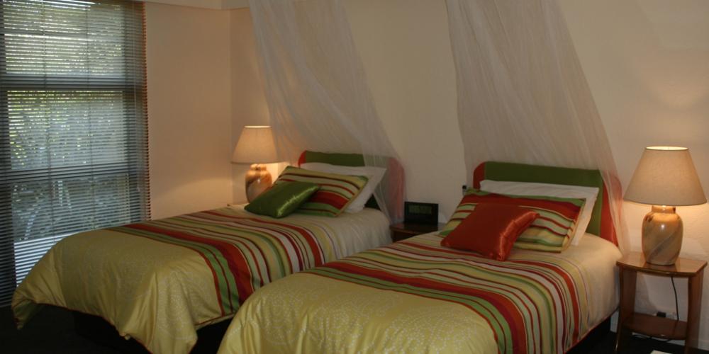 Internationally themed guest rooms 4 mosquito nets are just for decoration Twin Waters Lodge