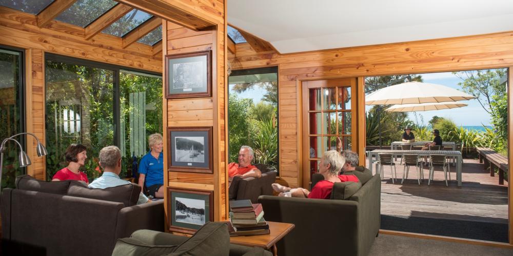 Torrent Bay Living Room to deck compr Wilsons Beachfront Lodges Abel Tasman National Park